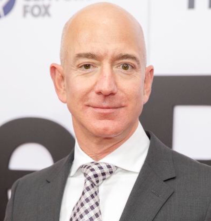 A photo of Jeff Bezos whose net worth is over a billion dollars.